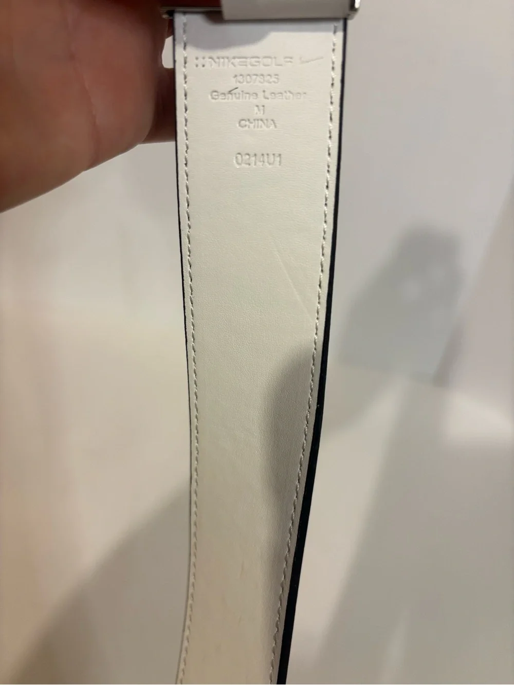 Nike Black Perforated Belt with Silver Oval Buckle